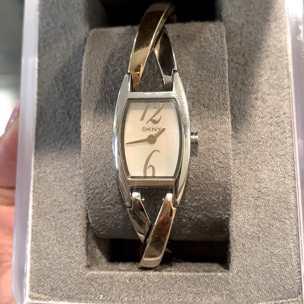 Feminine Donna Karen New York (DKNY) two toned (silver and gold tone) wristwatch